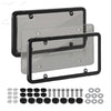A set of tinted license plate protectors and mounting hardware for vehicle plates.