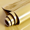 Roll of waterproof self-adhesive marble wallpaper in a golden yellow color