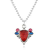 A pendant necklace featuring a red stone charm with blue and silver accents.