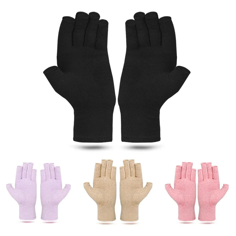 A set of black fingerless compression gloves and four pairs of light colored silicone or fabric gloves for relief.