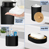 Matte black bathroom accessories set featuring a foam soap dispenser, cotton ball holder, toothbrush holder, and soap dish.