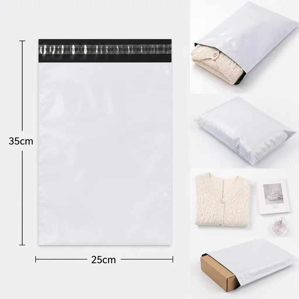 A white self-sealing mailing bag with a black seal strip and a beige fabric tag is shown next to a folded white bag.