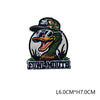 A black embroidered hunting patch featuring a stylized owl face wearing sunglasses and text.