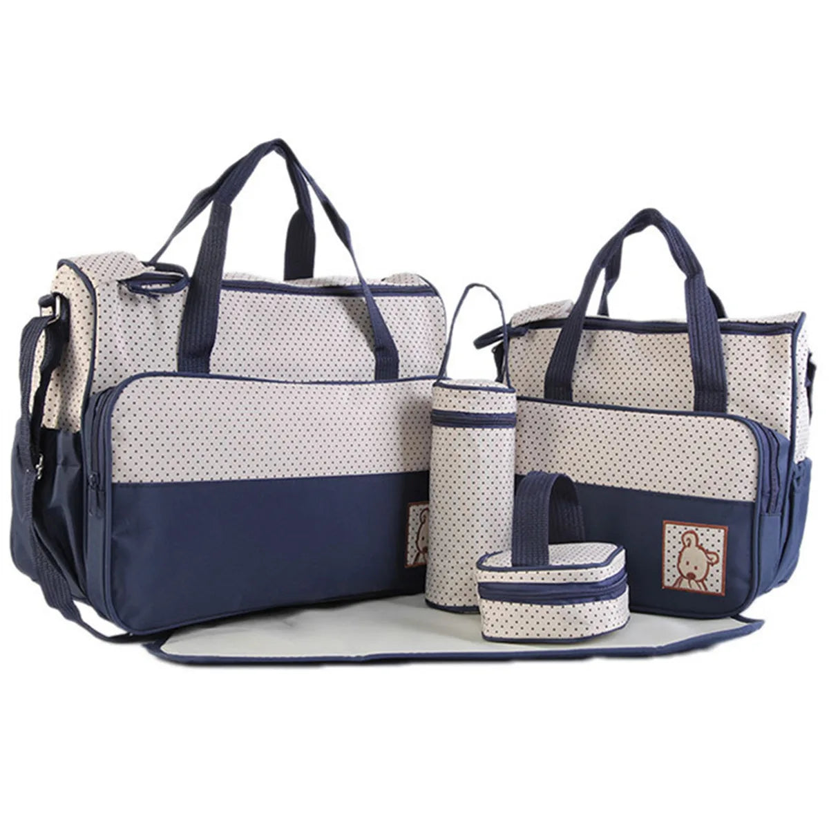 A set of navy blue and beige multifunctional crossbody diaper bags with handles and pockets.
