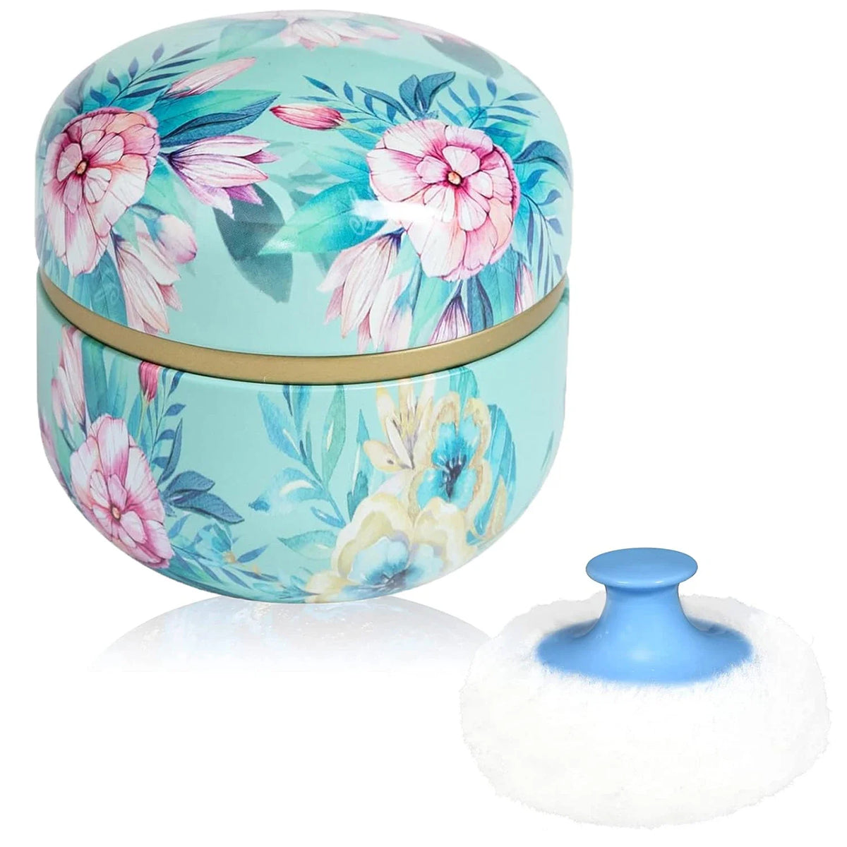 A round, light blue container with floral patterns and a gold rim, shown next to a white cosmetic puff.