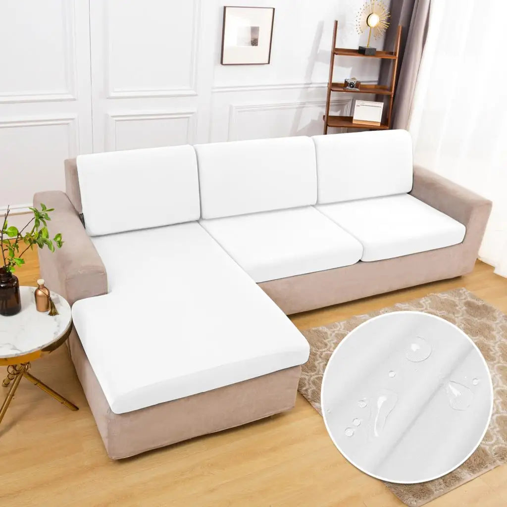 A beige sofa cushion cover with a white elastic edge is displayed on a light wood floor.