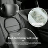 Black technology anti-static memory foam car headrest and lumbar support pillows in a car interior.