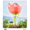 A red pull-string flying saucer launcher toy for kids is shown against a blurred outdoor background.