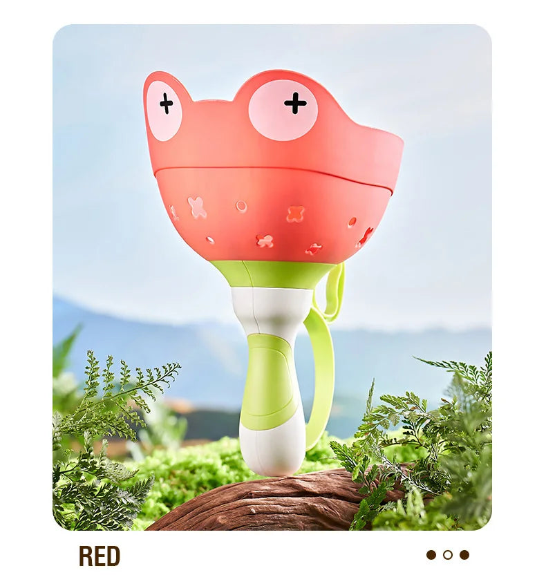 A red pull-string flying saucer launcher toy for kids is shown against a blurred outdoor background.