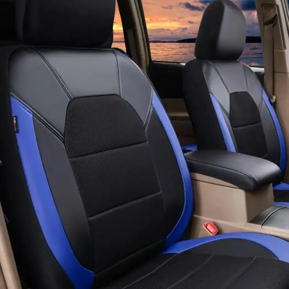 A close-up view of a black car seat with blue accents and breathable mesh upholstery.