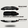 Three views of a black metal shell product with a silicone protective cover for a key fob.