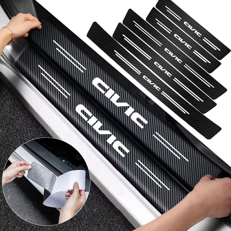 Black carbon fiber door sill protector stickers installed on a vehicle's side.