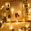 A book titled The Stiletto Book is illuminated by warm white LED photo clip string lights.