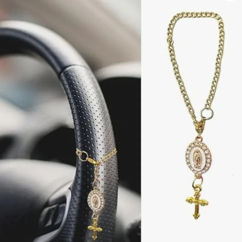 Gold chain rosary necklace with a cross pendant displayed against a white background.