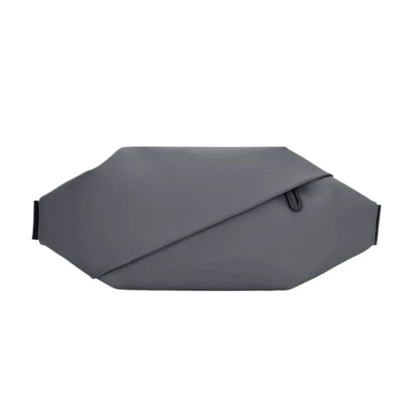 A gray minimalist waterproof running waist pack shown from the side.