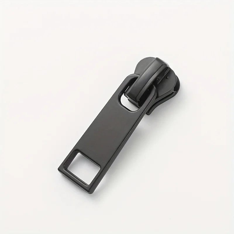 A black universal zipper slider repair kit with three different sized sliders displayed on a white background.