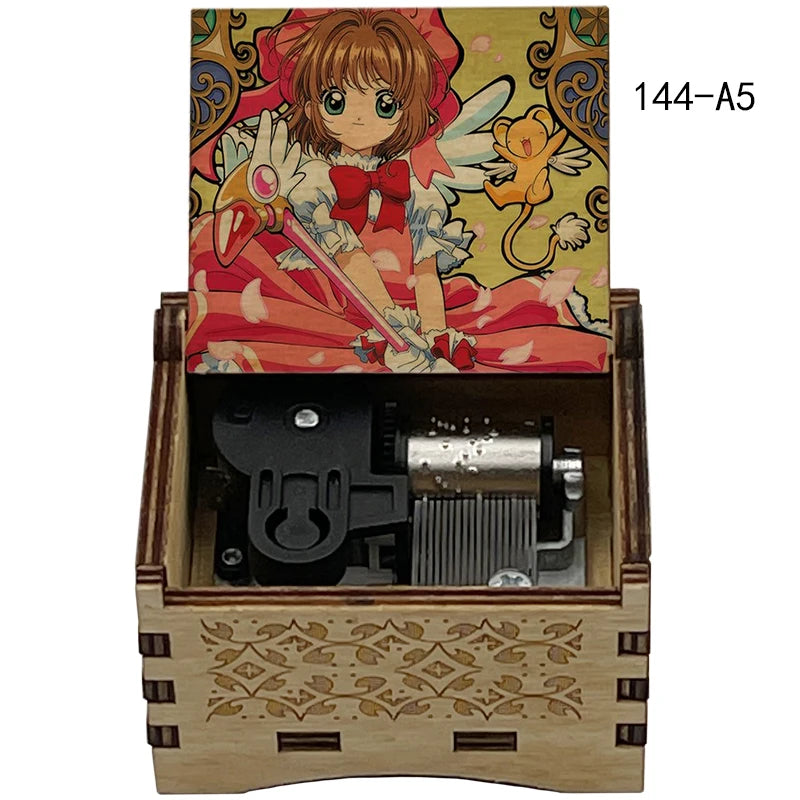 A wooden music box featuring a Cardcaptor Sakura theme with an illustration of Sakura, and an internal mechanism for playing 
