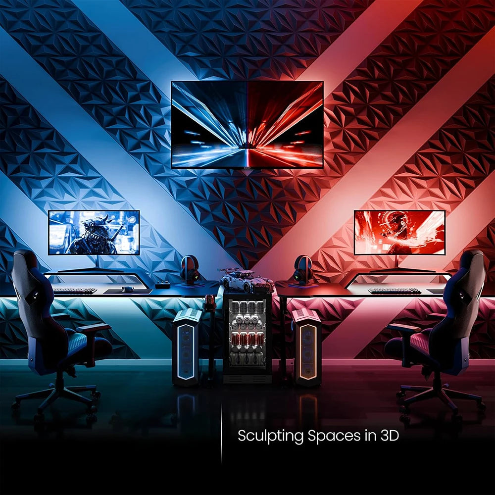 A modern accent wall featuring diamond textured panels with blue and red lighting, displaying three monitors.