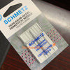 A packet of Schmetz Hohlsaum-Nadel Hemstitch Needle 130/705 H wing needles for sewing machines.