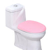 A white toilet with a pink soft flannel seat cover installed.