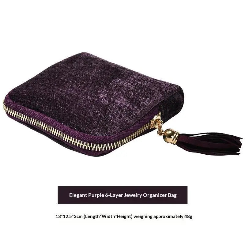 Elegant purple 6-layer jewelry organizer bag made of velvet with a gold zipper.