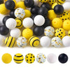 A collection of colorful 3D bee silicone beads in yellow, black, and white for jewelry making and DIY crafts.