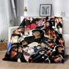 A printed flannel throw blanket featuring multiple portraits of Michael Jackson.