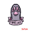 Embroidered rose skull patch with iron-on backing featuring a dark gray skull design.