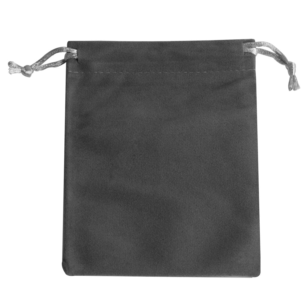 A dark gray velvet drawstring jewelry pouch with light twine ties.
