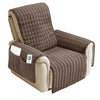 A brown quilted waterproof non-slip recliner sofa cover with side pockets shown from the side.