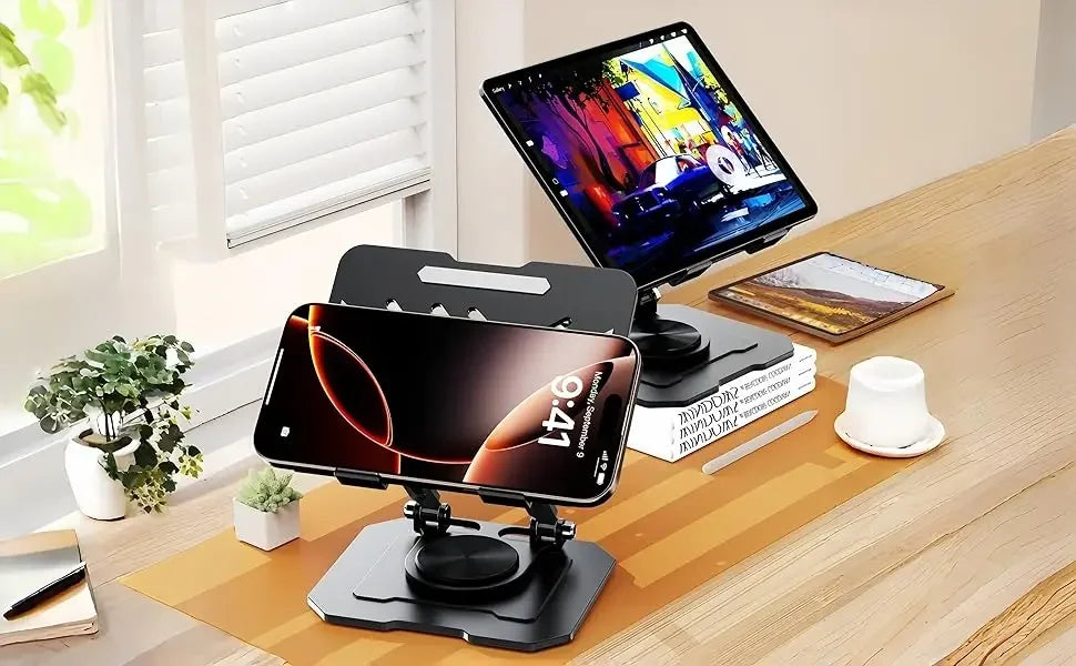 A 360° rotating carbon steel tablet stand is shown on a wooden desk with a laptop and a tablet in the background.