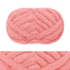 A pink chunky chenille yarn ball with a textured, ribbed surface.