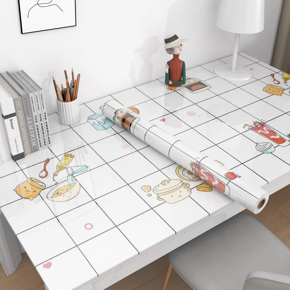 Roll of self-adhesive marble contact paper for kitchen and bathroom surfaces displayed on a white table.