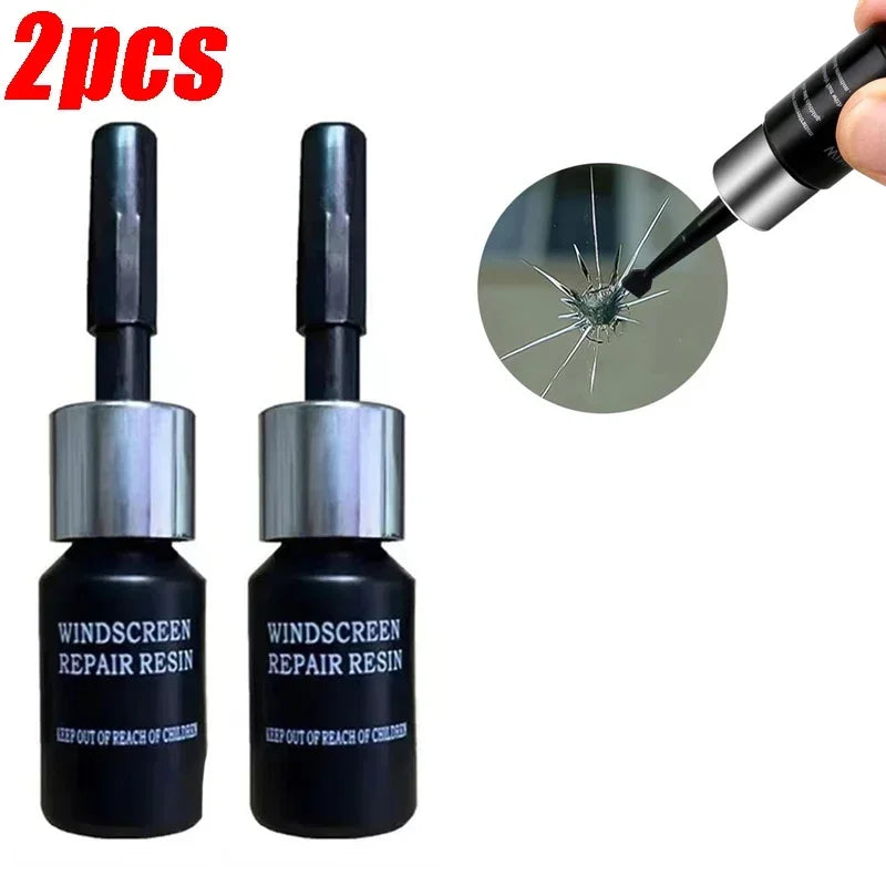Two tubes of windshield repair resin and a tool for applying the nano resin to fix cracks