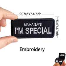 Black embroidered patch that says Mama Says I'm Special with measurements shown.