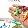 A hand holds a set of ten mini dinosaur figurines, including a green T-Rex and other species, displayed against a ruler.
