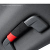 A close-up of a black grab handle protector cover with a red accent on a gray fabric surface.