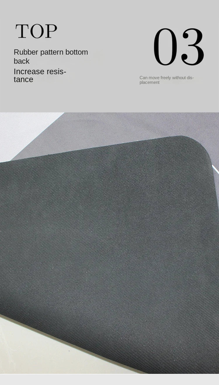 A close-up view of a dark gray natural diatomium mud floor mat.