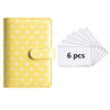Yellow polka dot PU leather binder wallet with cash envelopes and card holder shown next to a stack of six plastic cards