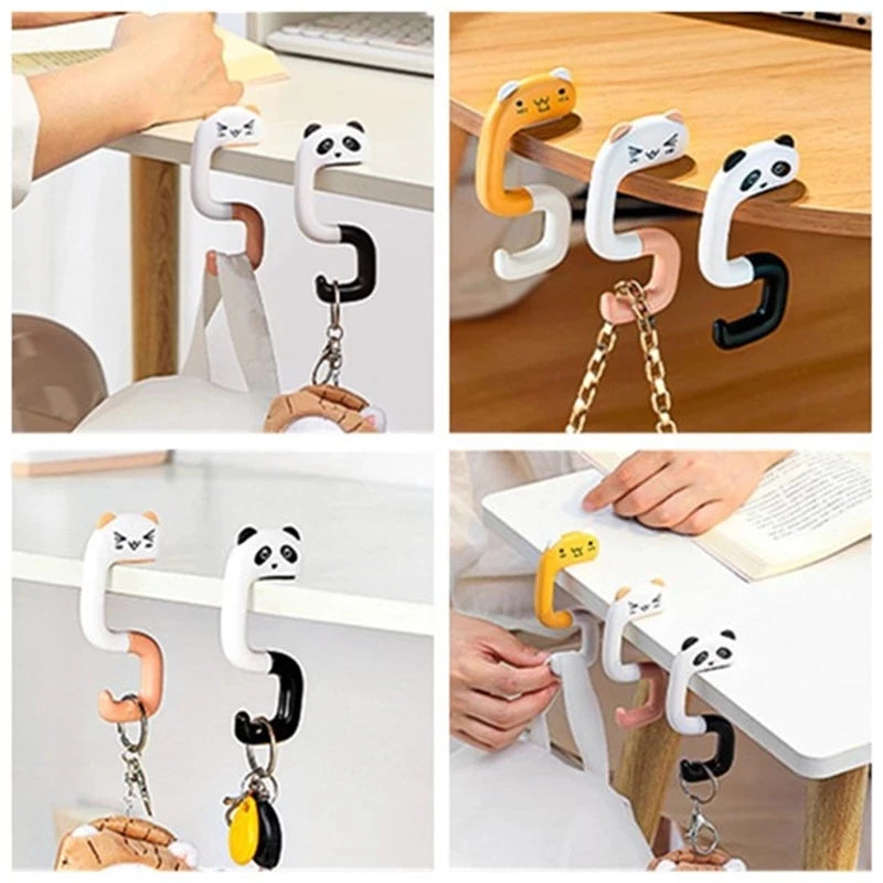 Various portable bag hooks in white, black, and yellow are shown attached to a desk or table surface.