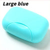 A large blue portable soap holder with a lid, designed as a leak-proof travel case for the bathroom or shower.