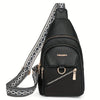 Black PU leather crossbody bag with a patterned adjustable strap and gold hardware