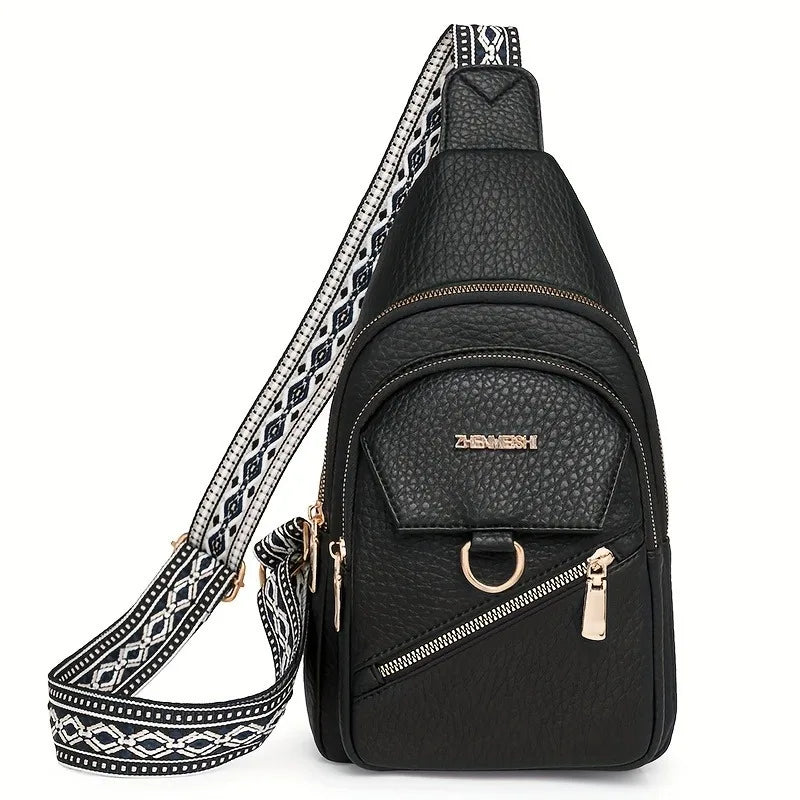 Black PU leather crossbody bag with a patterned adjustable strap and gold hardware
