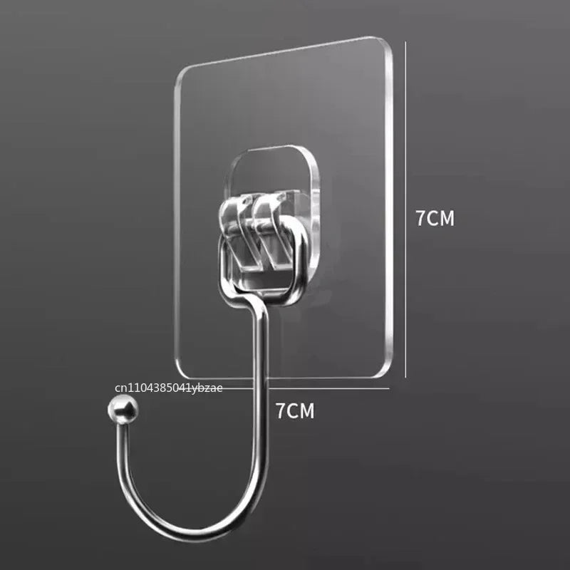 Clear self-adhesive rotating wall hooks for storage, shown against a gray background.