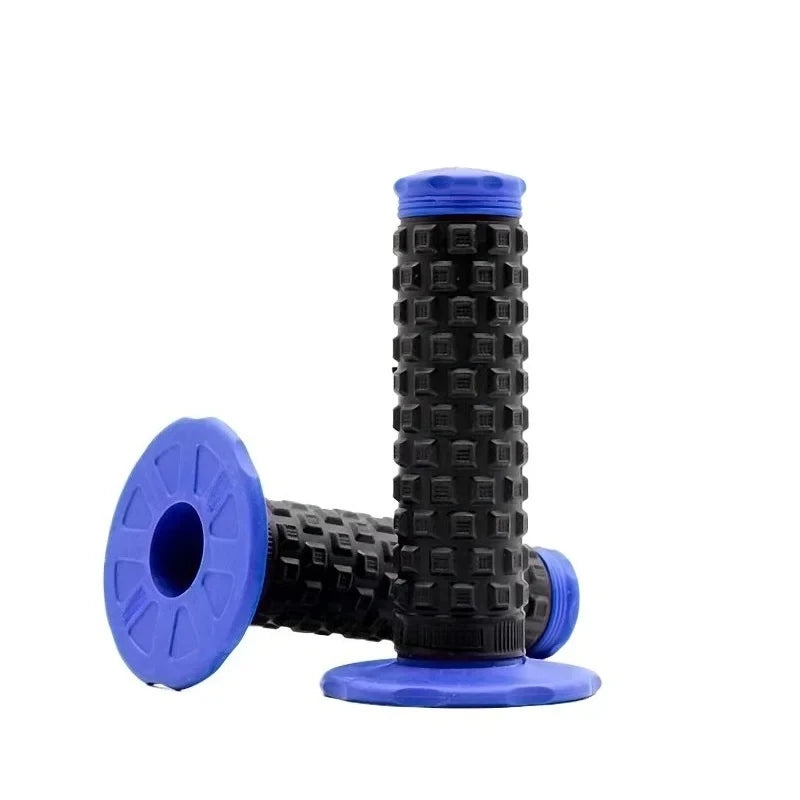 A close-up view of a blue and black motorcycle pillow top grip for handlebars.