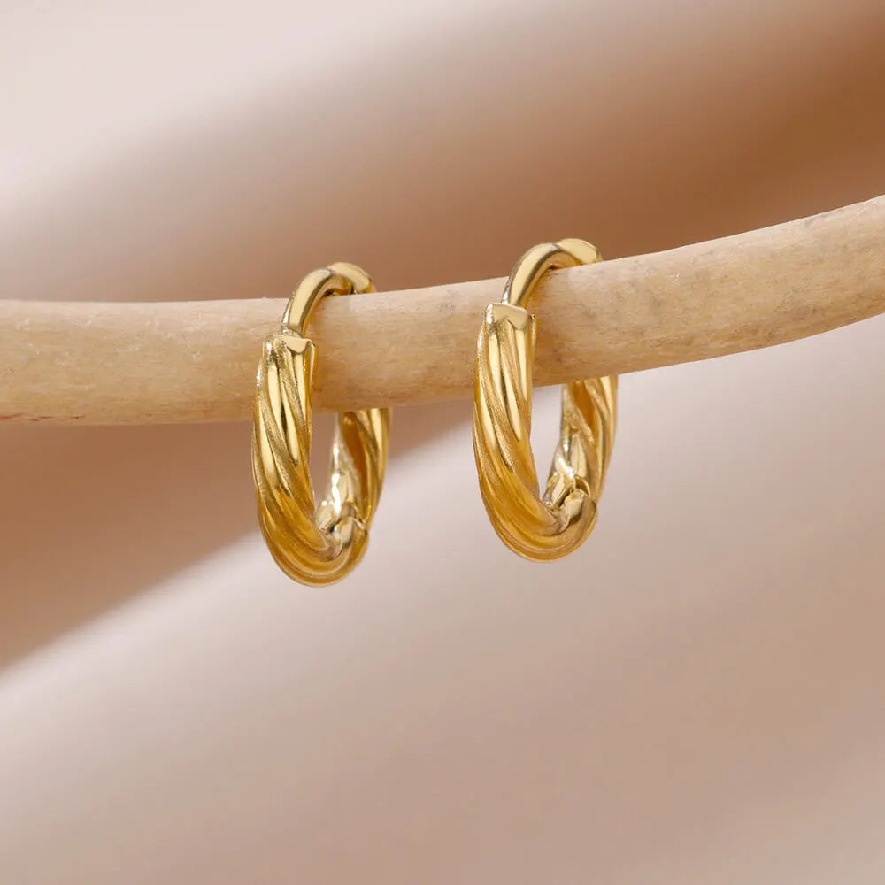 Boucles d'oreilles créoles en zircon cubique ton or