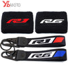 Black fabric covers featuring red and white logos for Yamaha R1 and R6 brake fluid reservoirs