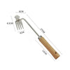 Stainless steel weeding tool with a long handle and fork for garden root removal
