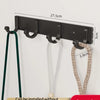 Black fantasy night clothes hook with adhesive backing featuring four hooks