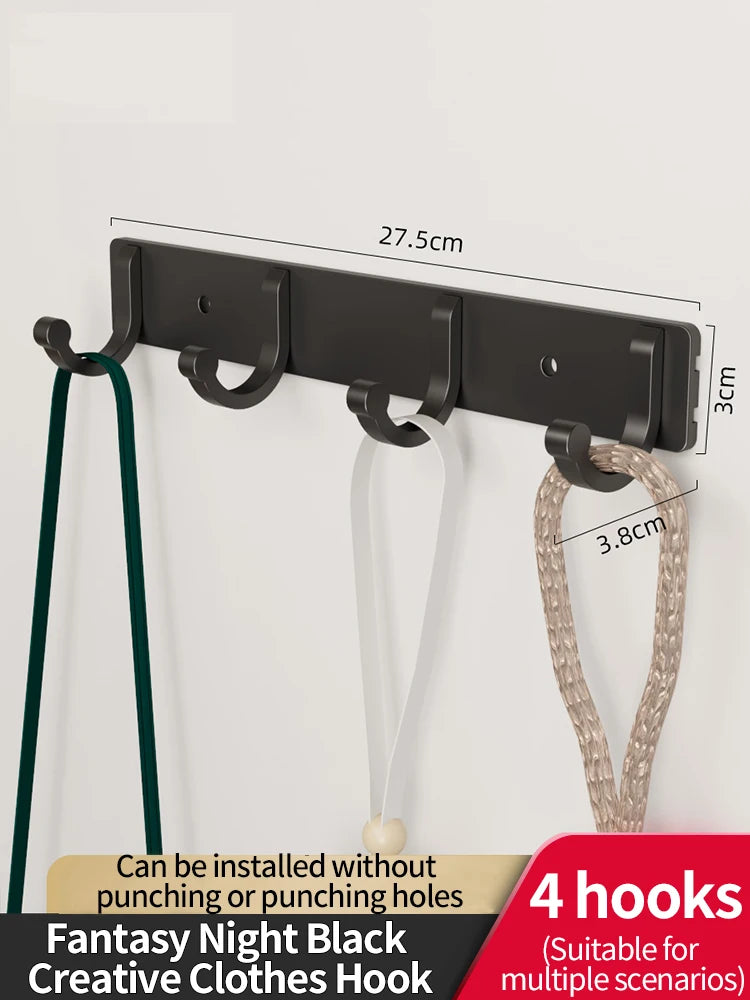 Black fantasy night clothes hook with adhesive backing featuring four hooks